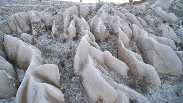 Volcanic rocks of Cappadocia in the winter in Turkey. Aerial view.