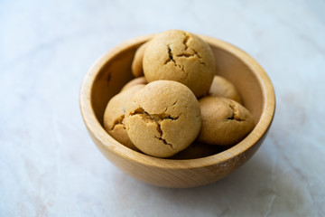 Healthy Organic Freshly Baked Homemade Peanut Butter Cookies in Wooden Bowl.