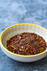 Winter Berry Dried Rooibos Tea Pieces with Dry Strawberry, Hibiscus, Flavoring, Cinnamon, Cloves, Rosehip, Apple, Calendula, Vanilla bits.