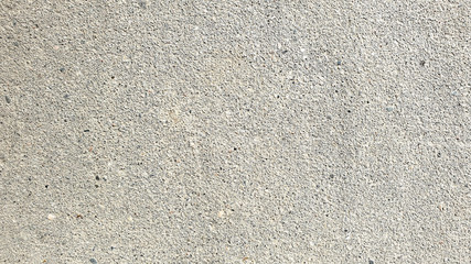 Gray asphalt background. Rough texture.