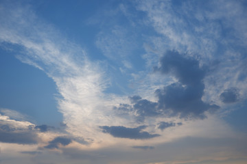 Naklejka na ściany i meble Gray cloud and sunlight on blue sky at evening for background;