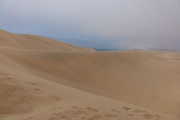 Fototapeta na wymiar DUNE DESERTO E MARE SANDWICH HARBOUR NAMIBIA - DESERT DUNE AND SEA SANDWICH HARBOR NAMIBIA