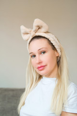 portrait of a beautiful young woman in home interior