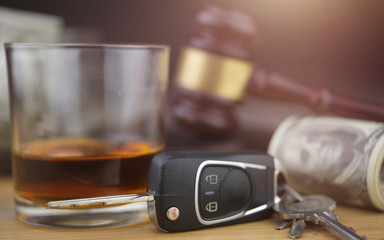 Judge hammer and whiskey glass,car key.Driving while drunk concept.