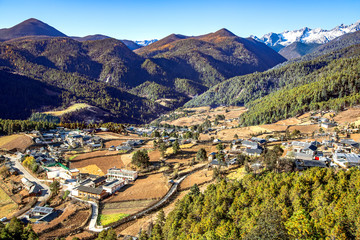 Fototapeta na wymiar Baishuitai small city is located in the foothills of the Haba Snow Mountains, 101km southeast of Shangri-La. Yunnan, China