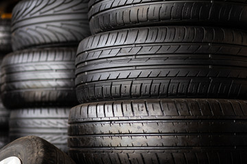 Obraz premium Satck of car tires texrture background in automobile store