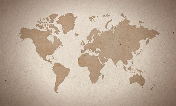 world map silhouete on old paper surface © agrus