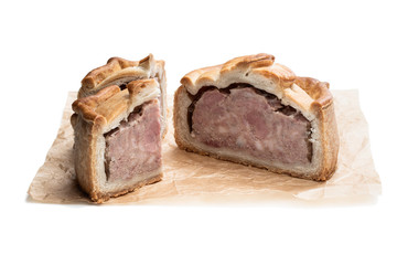 Seasoned cured pork and ham pie isolated on white