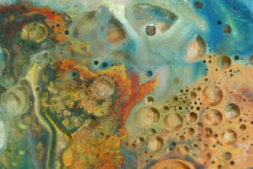 Abstract liquid ink marble color waves and bubbles