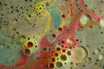 Abstract liquid ink marble color waves and bubbles