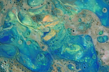 Abstract liquid ink marble color waves and bubbles
