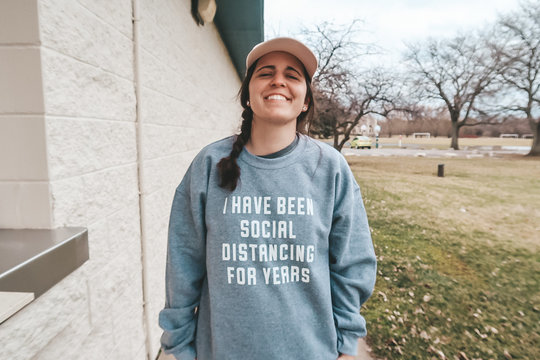 Portrait Of Young Lady Wearing A Gray Social Distancing Crewneck