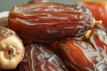 Raw date fruit ready to eat. Traditional, delicious and healthy ramadan food. Detailed view.