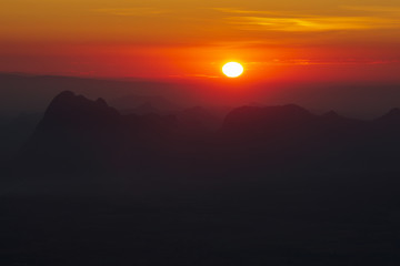Naklejka na ściany i meble Mountain landscape,Panoramic view misty morning sunrise in mountain at north Thailand 