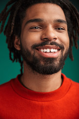 Obraz premium Portrait of a young african man wearing pullover