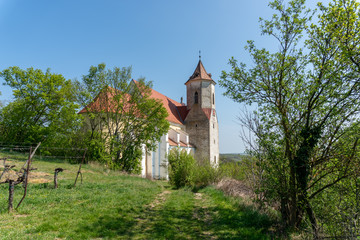 Fototapeta premium Falkenstein Church and village in Weinviertel, Lower Austria during summer.