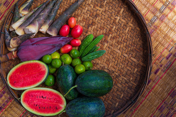 Group of Asian or Tropical fruit in basket, Thailand