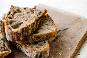 Sliced bread isolated on a white background. Bread slices and crumbs viewed from above. Top view