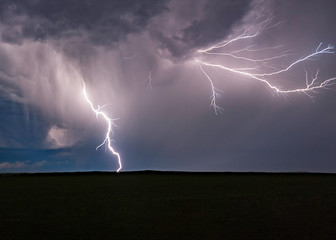 Naklejka na ściany i meble Lightning storms on the Great Plains During Summertime