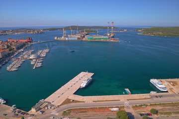PULA, CROATIA - SEPTEMBER 13, 2019: Aerial shot of Pula old shipyard, marina and cruise harbor, Istra region, Croatia.