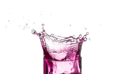 Purple water splashes  The concept of a refreshing drink