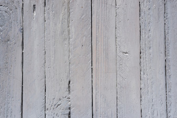 freshly painted white wooden fence, light plank wall, textured wooden background