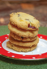 Stack of cookies on a red and white plate