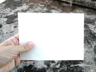 hand holding blank card