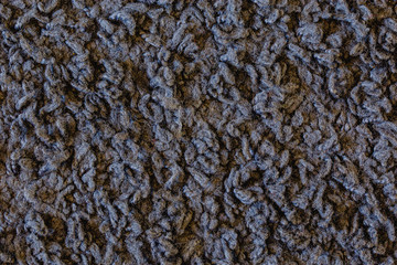 Black carpet, fabric texture close-up