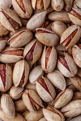 Pistachios texture and background . Tasty pistachios as background,as pistachios texture.Concept of nuts. flat lay