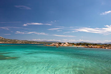 Panoramic view of the sunny beaches, and of the clear and transparent waters of the Maddalena island in Sardinia, Italy.