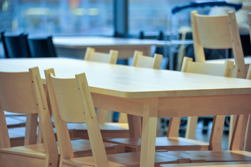 Chairs and tables in the interior. Elements of the interior. Close-up. Background without sharpness.