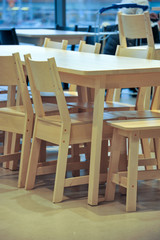 Chairs and tables in the interior. Elements of the interior. Close-up. Background without sharpness.