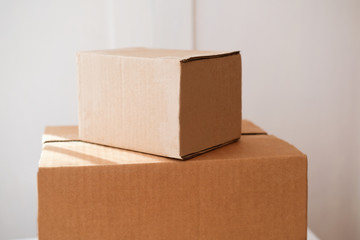 shopping boxes left near house door. contactless delivery concept. safe shopping and delivery of...