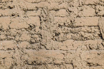 Clay wall collapses as an abstract background
