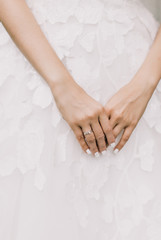 Close-up tender bride's hands