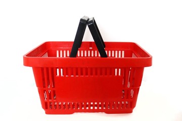 Red basket for products on a white background. Food basket
