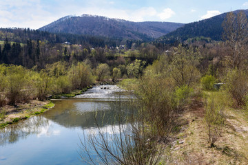 MSZANA DOLNA, POLAND - APRIL 07, 2019:  The Mszanka river and recreational areas on its banks.