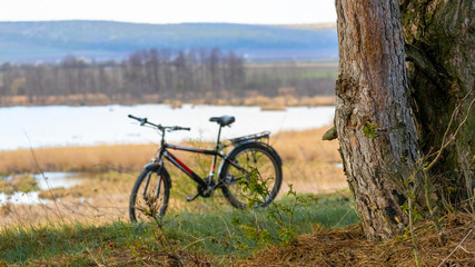 Bicycle on the river background, outdoor activities