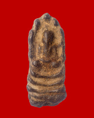 Thai Amulet isolate on a white background.