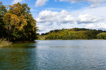 Fototapeta premium Hancza lake view from the middle of water. Sunny day weather, calm, peaceful landscape view. Blaskowizna, Poland, Europe.