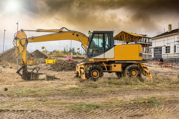 An yellow bulldozer at a construction site