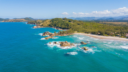 Fototapeta na wymiar Aerial view of Barra beach - Garopaba. Beautiful natural beach in Santa Catarina, Brazil