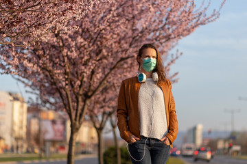 Woman wearing face protection mask during covid-19 pandemic