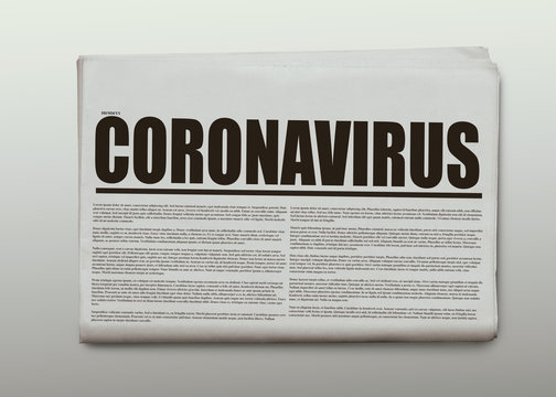 Coronavirus written headlined newspaper isolated on a white background