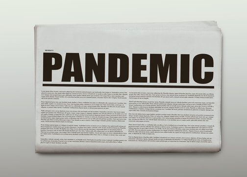 Pandemic written headlined newspaper isolated on a white background
