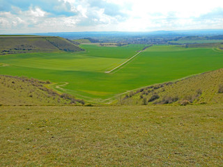 Fototapeta na wymiar Paragliding above the hills at Mere in Wiltshire 