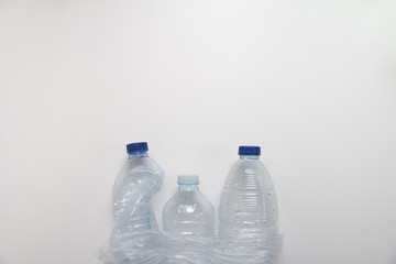 Naklejka premium plastic bottle for recycling conceptand ecology on wihte background. Stop plastic. protection world. Waste separation concept.