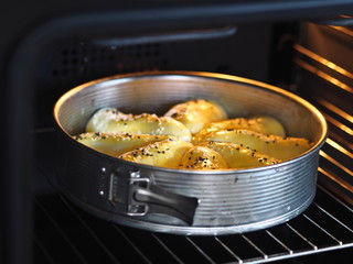 Homemade cakes in a baking dish in the kitchen oven.