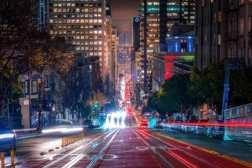 Foto op Aluminium San Francisco's famous California Street at night, with a view of the Bay Bridge, during a rainy night - Holiday Season 2019 © Wes Culver